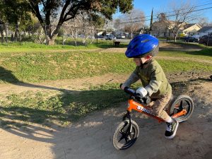 Ryder Morgan rides his adaptive Strider 12 Sport