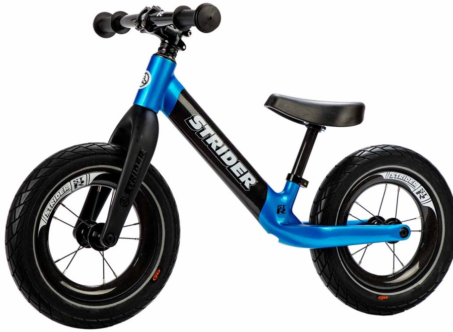 Studio image of blue Strider ST-R carbon fiber balance bike